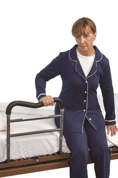 patient using bed safety rail