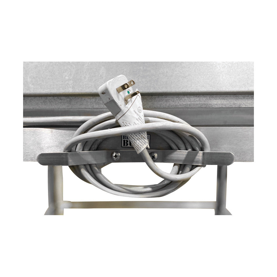 Blickman Digital Warming Cabinet For Table/Cart with a wrapped power cord and plug stored on a metal hook.