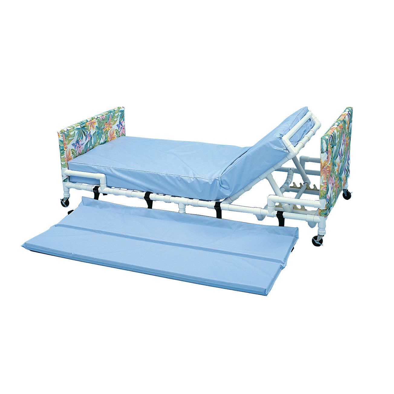 Healthline Low Bed with a blue mattress, adjustable headrest, floral side panels, and wheels. A matching mat is on the floor.