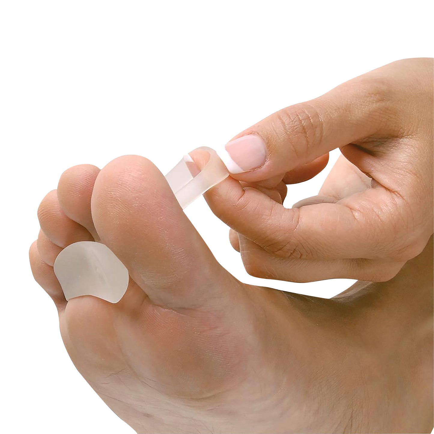 A person applies a PediFix Visco-GEL Hammertoe Crest between their toes for comfort and alignment.