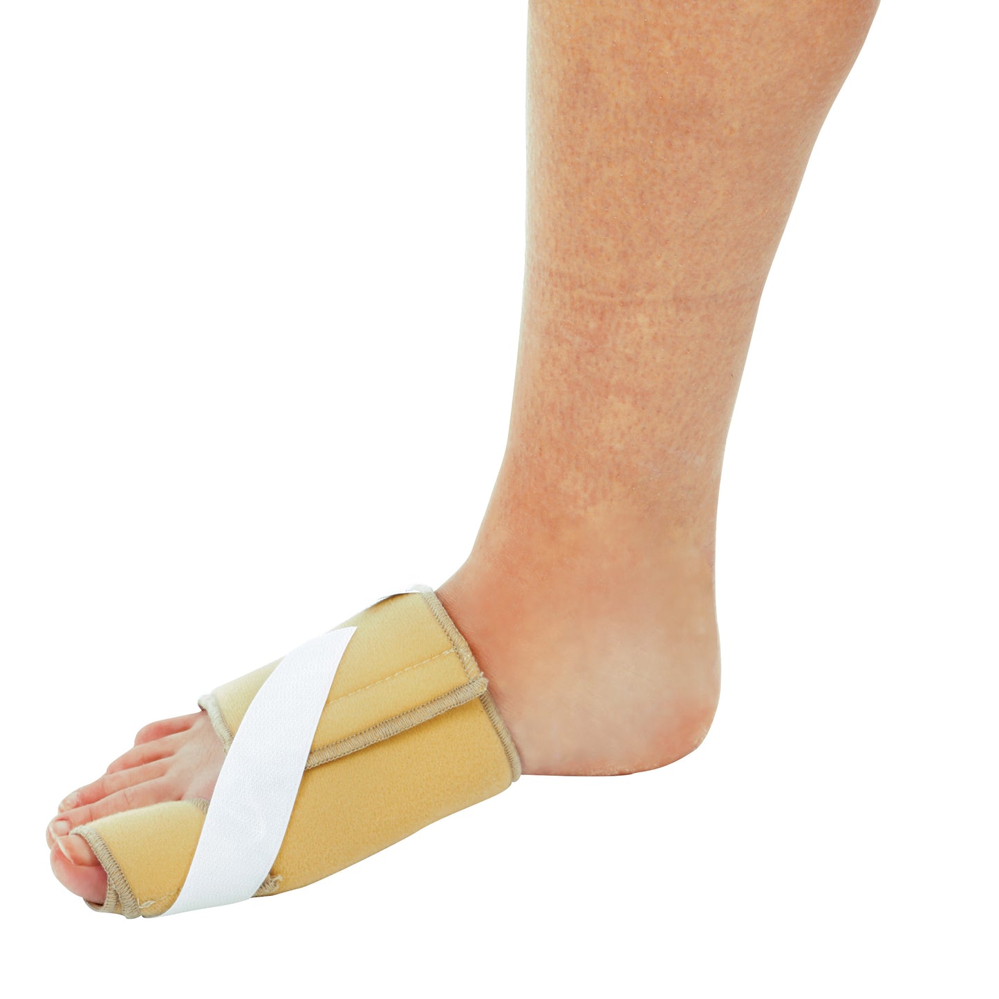 A foot wearing an AliMed Soft Toe Splint. The splint is beige with a white strap, supporting the big toe in an aligned position.