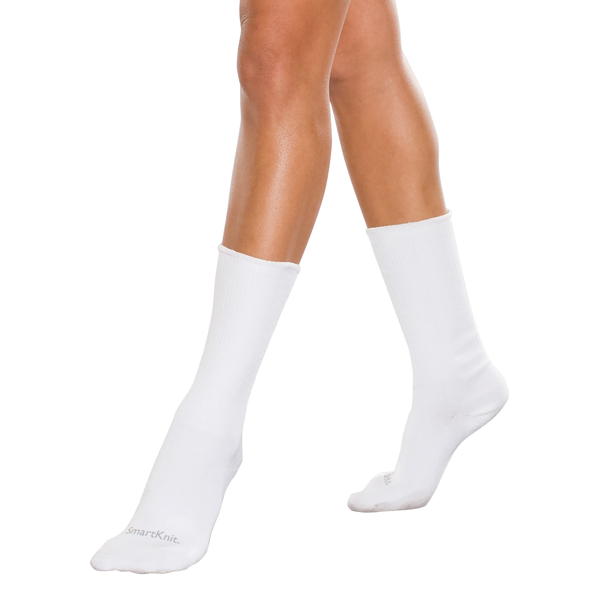 A pair of legs wearing SmartKnit Seamless Crew Socks. The socks are white, ribbed, and mid-calf length.