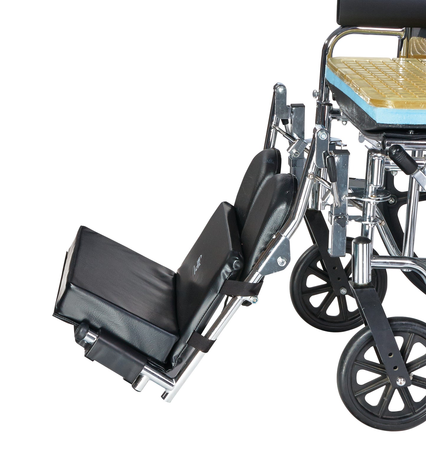 SkiL-Care Drop-Stop Wheelchair Footrest Extender attached to a wheelchair, providing padded support for extended leg elevation.