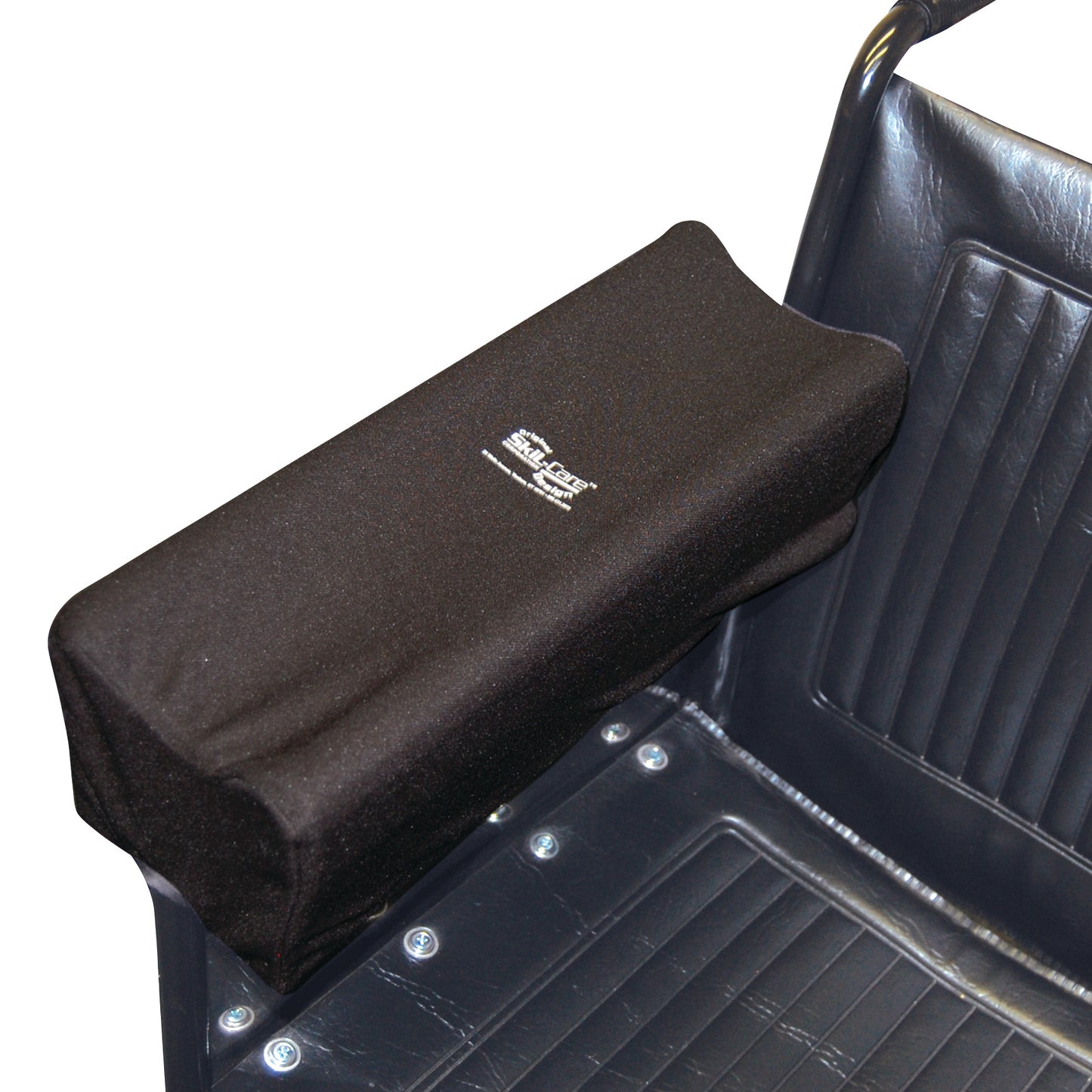 A wheelchair features a black SkiL-Care Lateral Stabilizer Arm Trough providing support on the armrest.