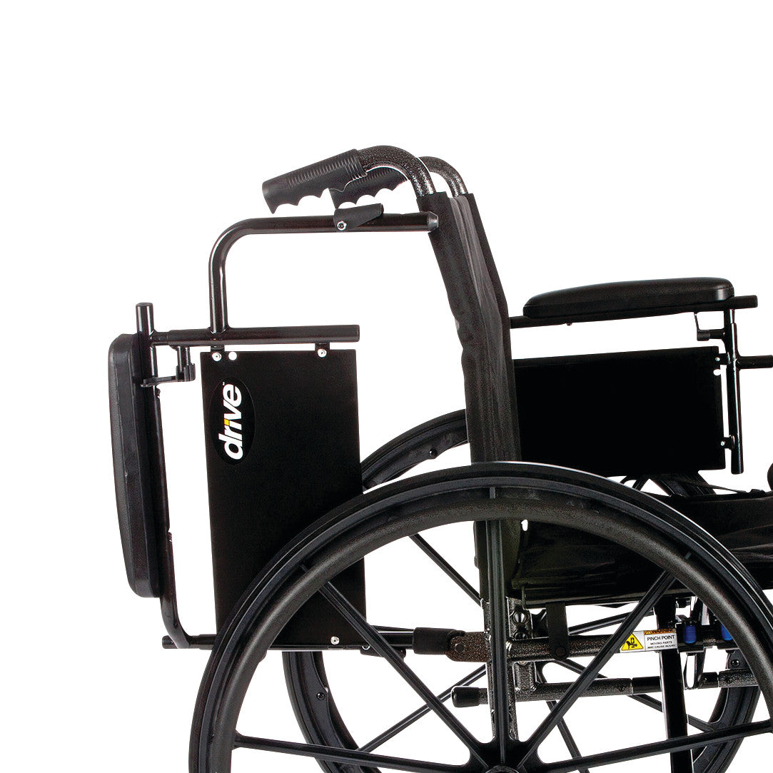Drive Medical Cruiser X4 Wheelchair with Removable Desk Arms and Swing-Away Footrests, featuring a large spoked wheel and handle grips.