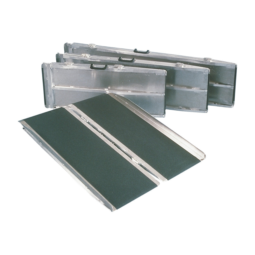 A PVI Single-Fold Wheelchair Ramp is shown, partially unfolded. It is made of metal with a black non-slip surface and has handles.