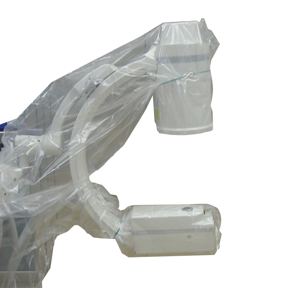 The image features a medical device covered with a TIDI Disposable Mini C-Arm Drape, secured with hook-and-loop closures.