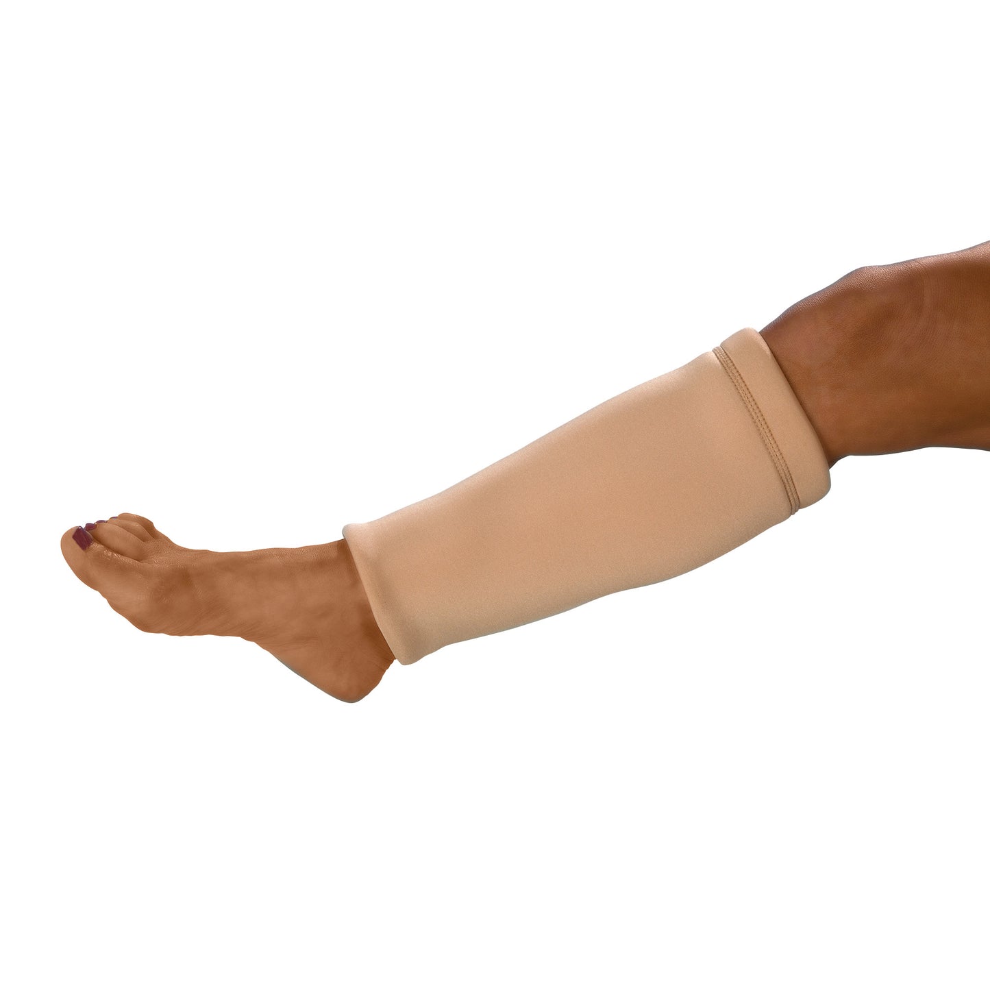 A leg wears the DermaSaver Shin Tube, a beige fabric tube covering the shin for protection.