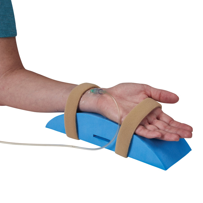 Arm rests on a blue foam wedge with straps, part of the AliMed Deluxe A-Line Support Splint, featuring an attached tube.