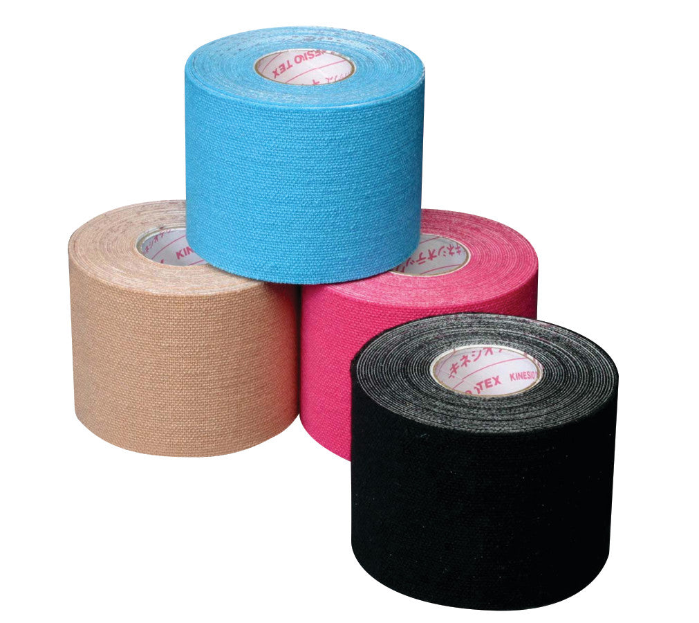 Four rolls of Kinesio Tex Gold FP Tape in beige, blue, pink, and black are stacked together.