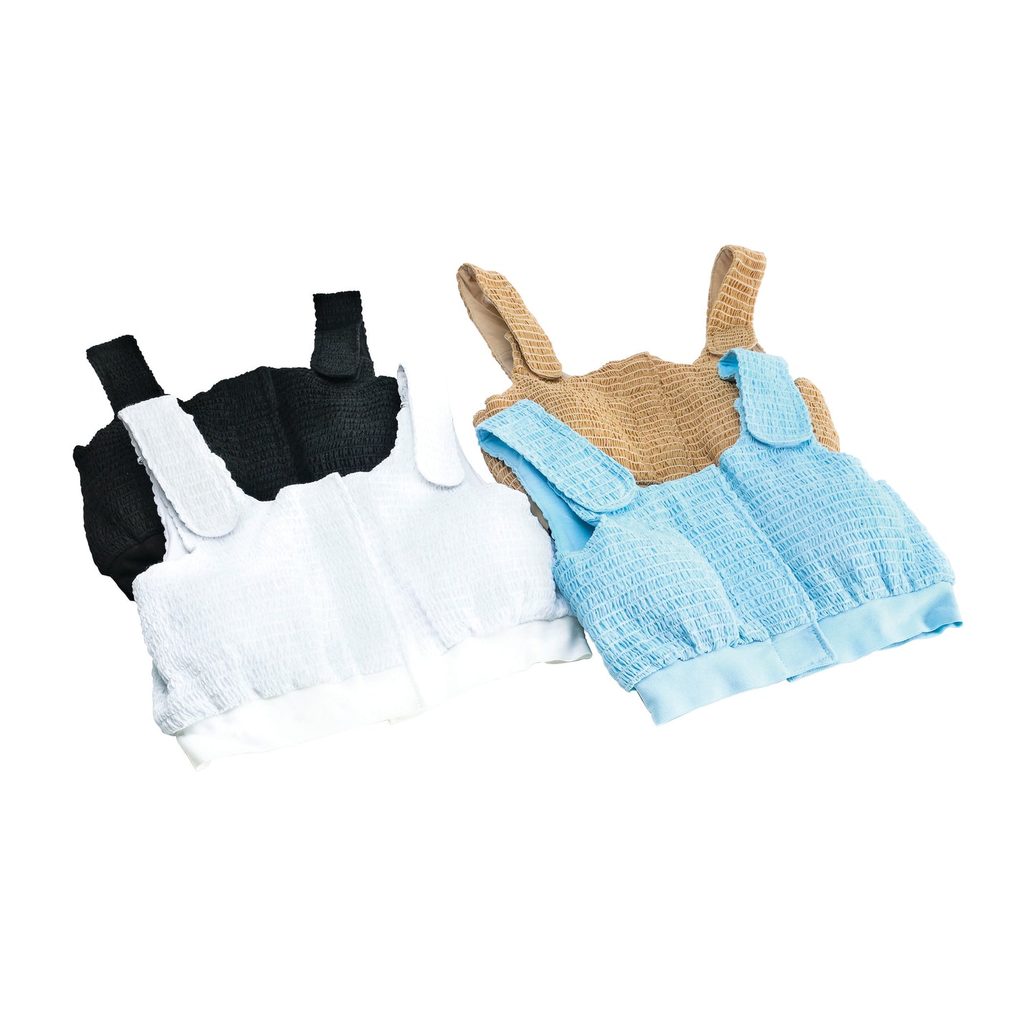 Three Expand-A-Band Compression Bras in black, white, and beige-blue, featuring a textured fabric and wide straps.
