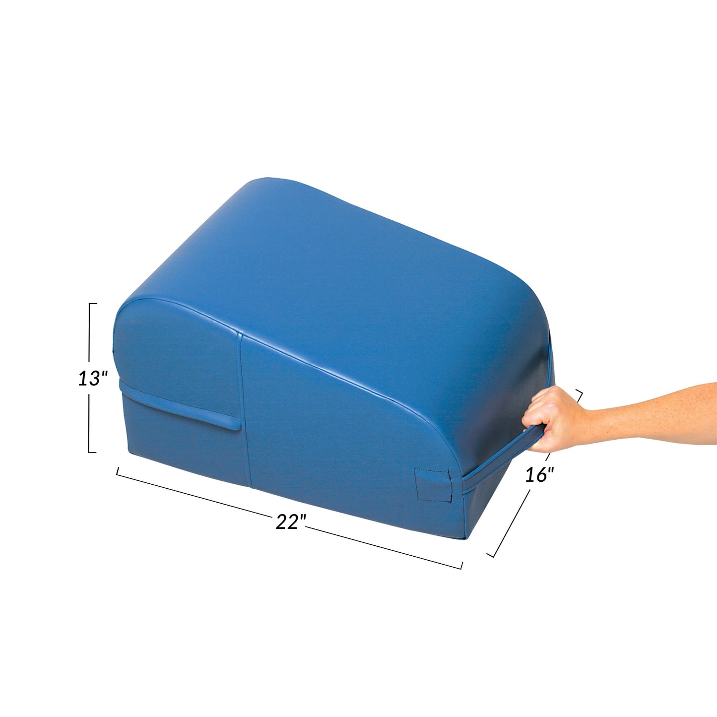 An AliMed Lower Extremity Wedge, measuring 22" x 16" x 13", with a hand shown pulling it by a strap.