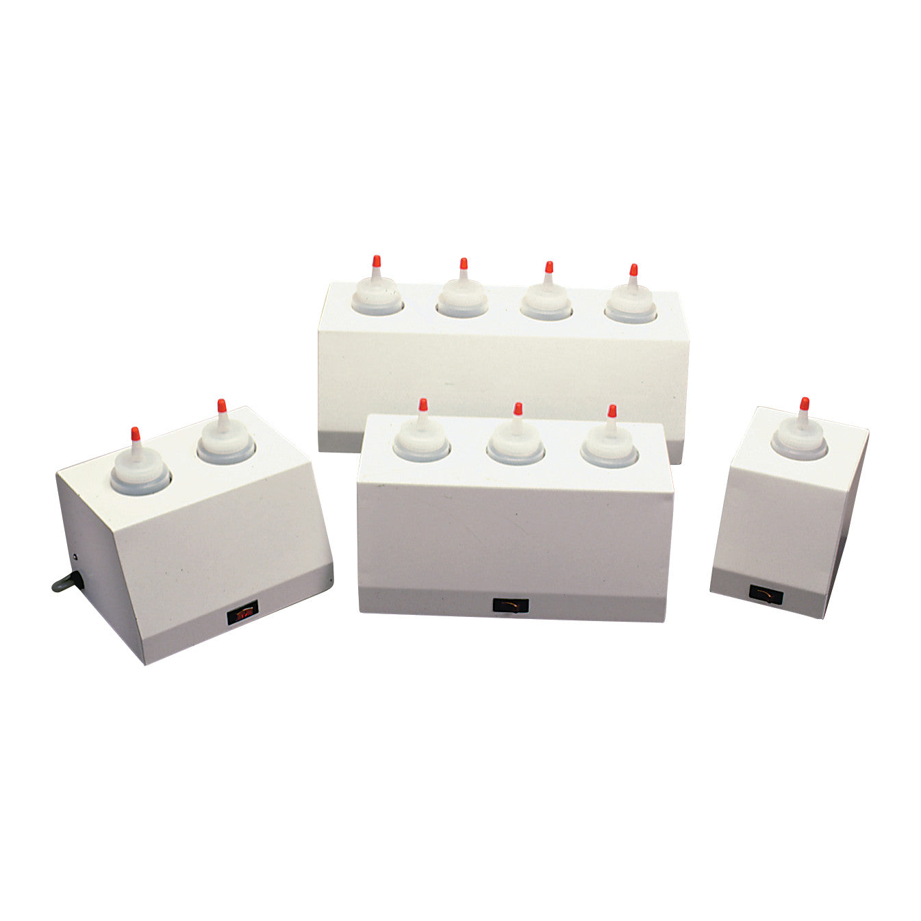 Four Ideal Lotion and Gel Warmers with different numbers of dispensers, featuring red-tipped white lids on a white base.