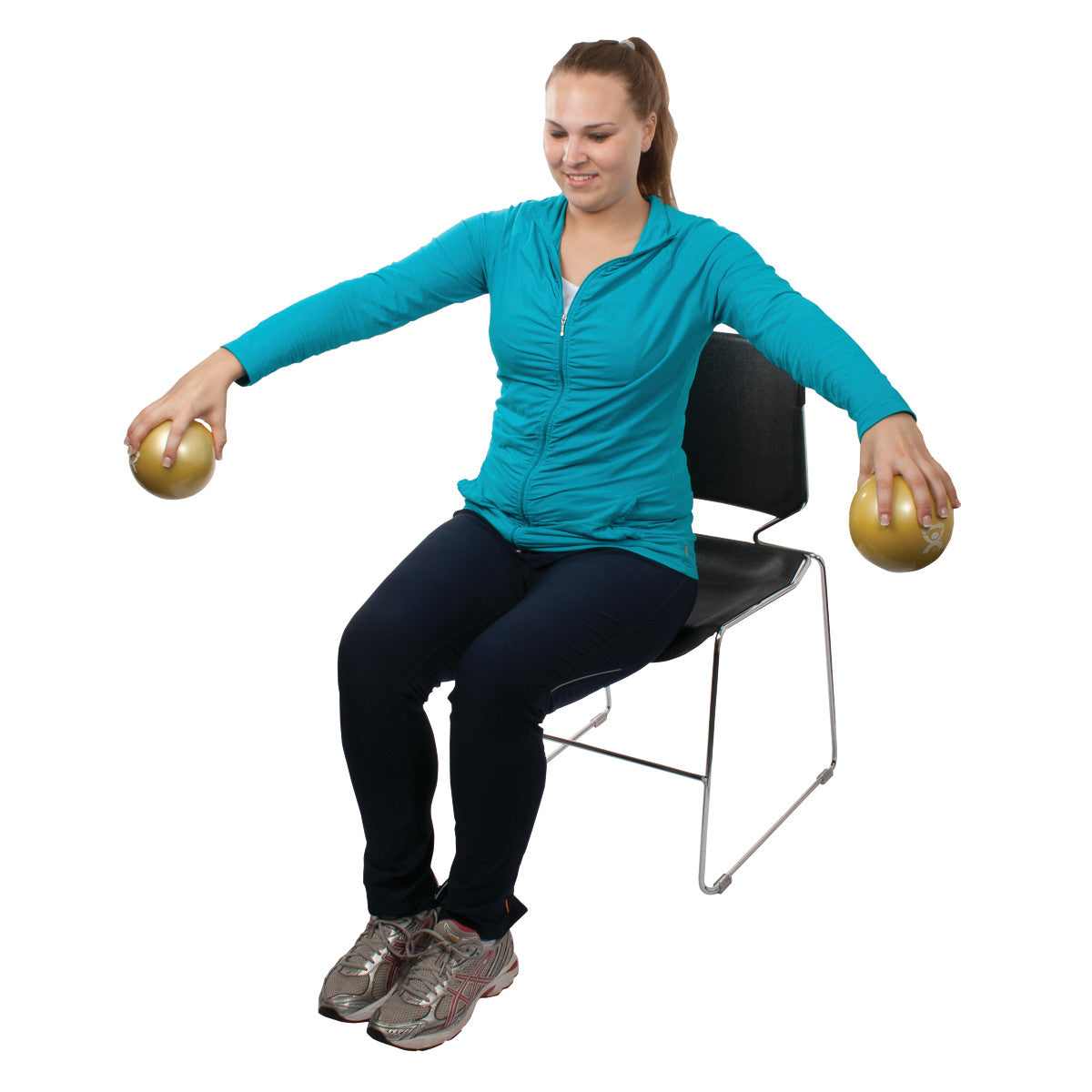 A person sitting on a chair exercises with CanDo Hand WaTE Balls, holding a ball in each hand, arms extended outward.