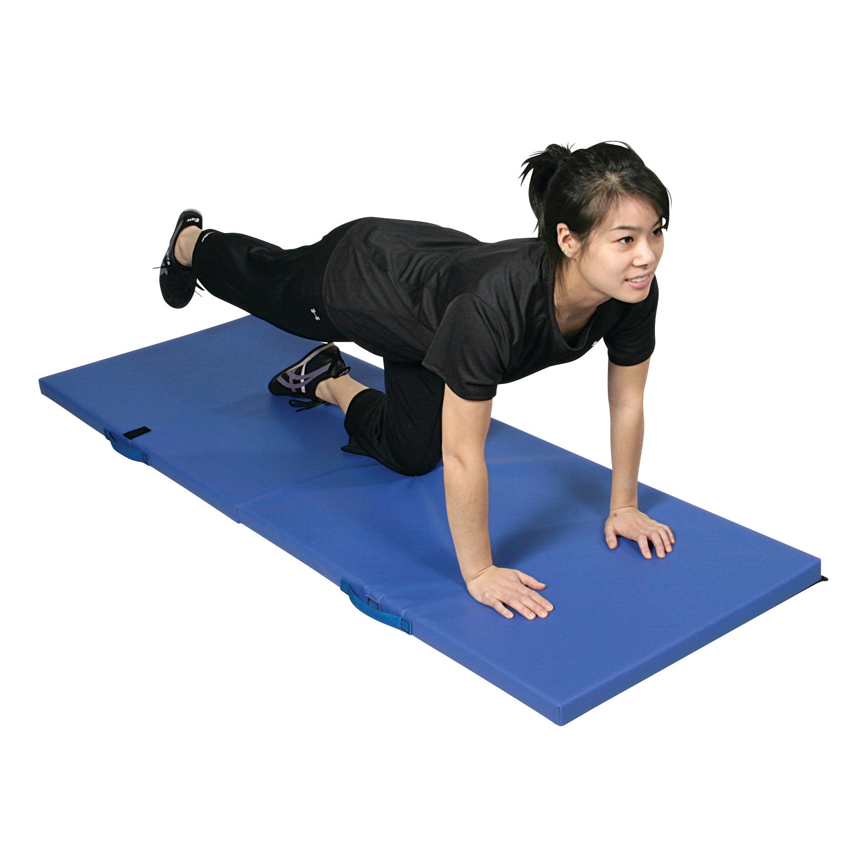 A person exercises on an AliMed Exercise Mat, holding a pose with one leg extended back, on a blue padded surface.