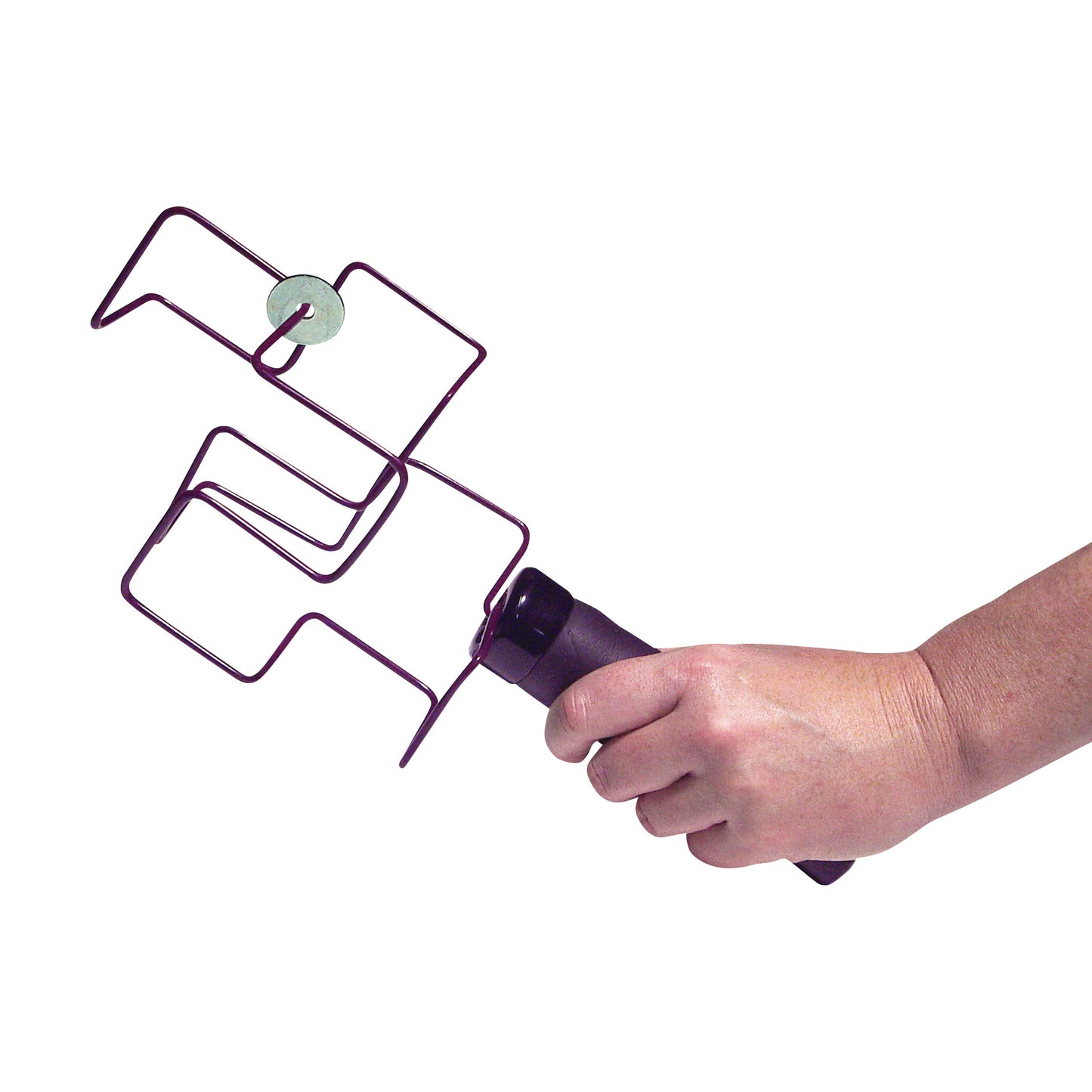 A hand holding a Jux-a-Cisor ROM Exerciser, featuring a metal wire design with a circular attachment, used for physical therapy.