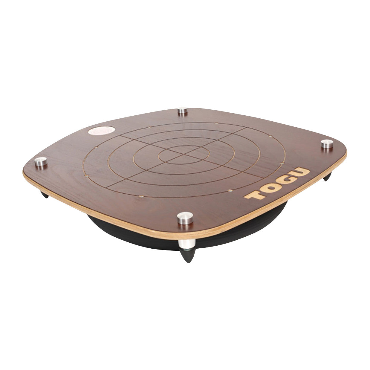 Square wooden TOGU Posturedo Balance Board with metal pegs and circular patterns on top, elevated for balance training.