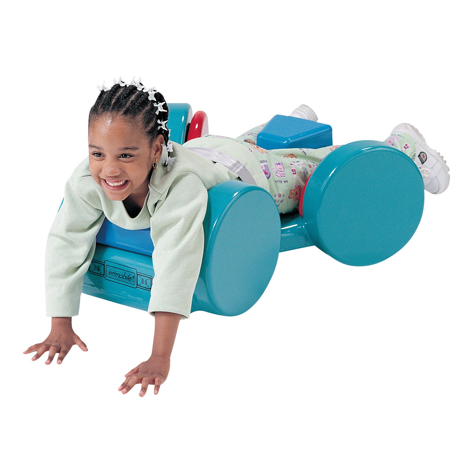 A child plays on a Tumble Forms2 Jettmobile Positioner. It's a blue therapeutic mobility aid with large wheels for support.