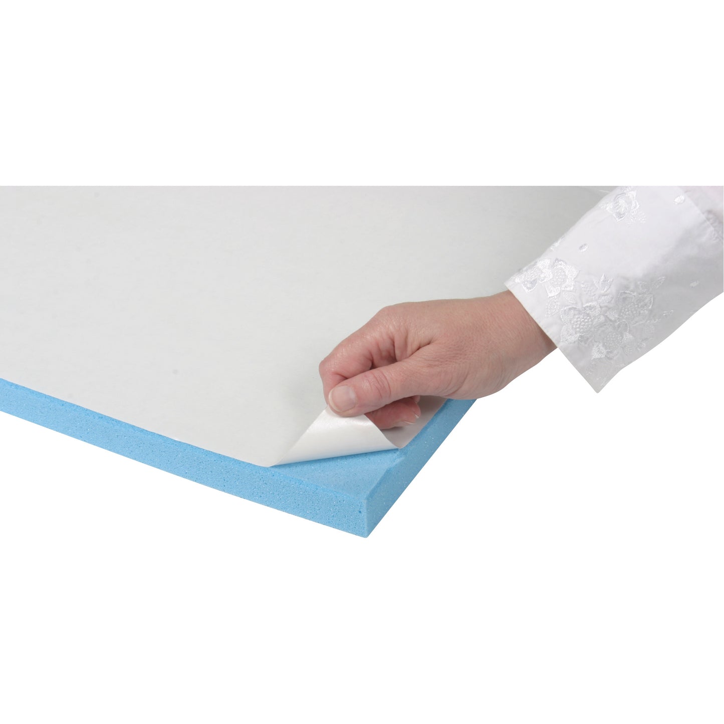 A hand peels back a corner of the AliMed T-Stick Adhesive-Backed Padding, revealing its blue foam layer and adhesive surface.