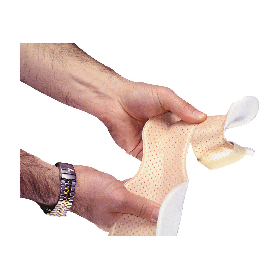 Hands are holding an AliMed Progressive Resting Splint, a beige perforated splint with straps for support and adjustment.