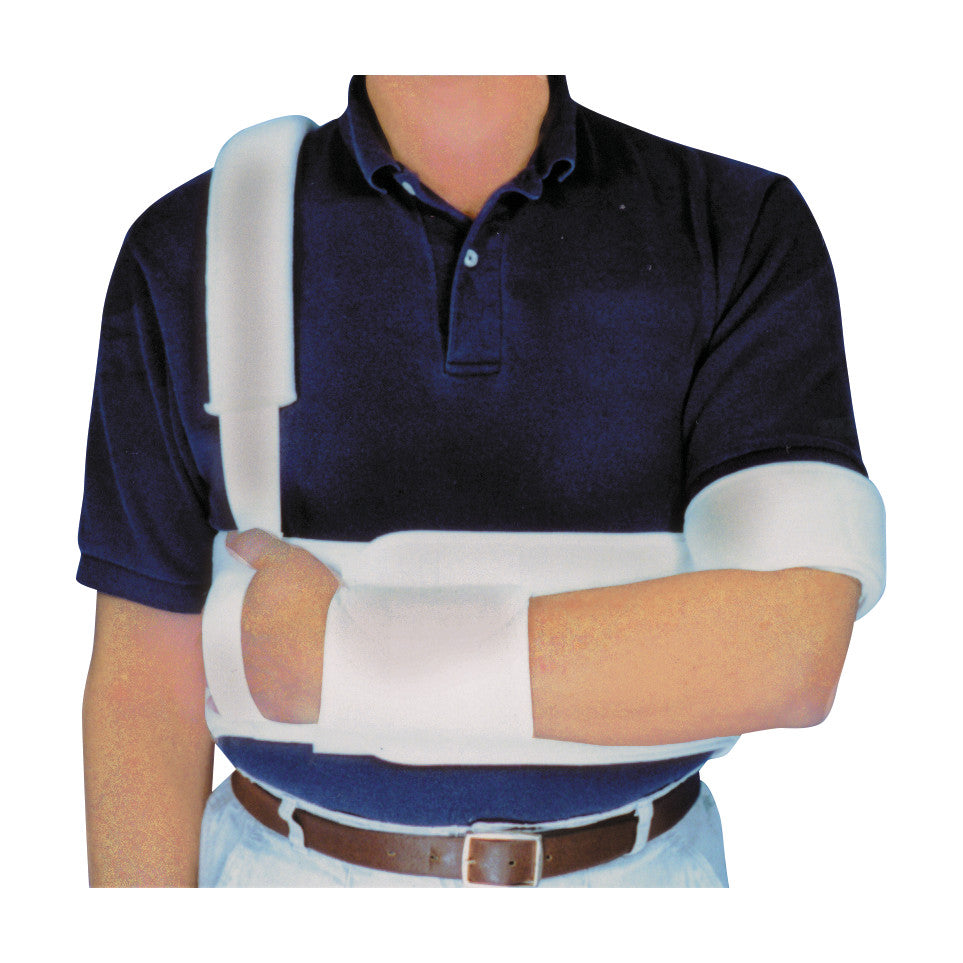 A person wearing a Universal Torso Shoulder Immobilizer over a navy polo shirt, stabilizing the left arm and shoulder.