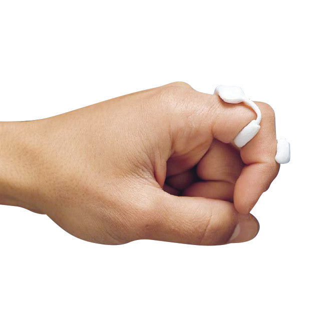 A hand wearing the DeRoyal LMB Light Flexion Finger Spring (Model 601), a white orthotic device supporting finger joints.