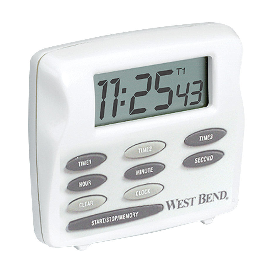 A white West Bend Triple Timer Clock showing 11:25 with multiple buttons labeled for different functions below the display.