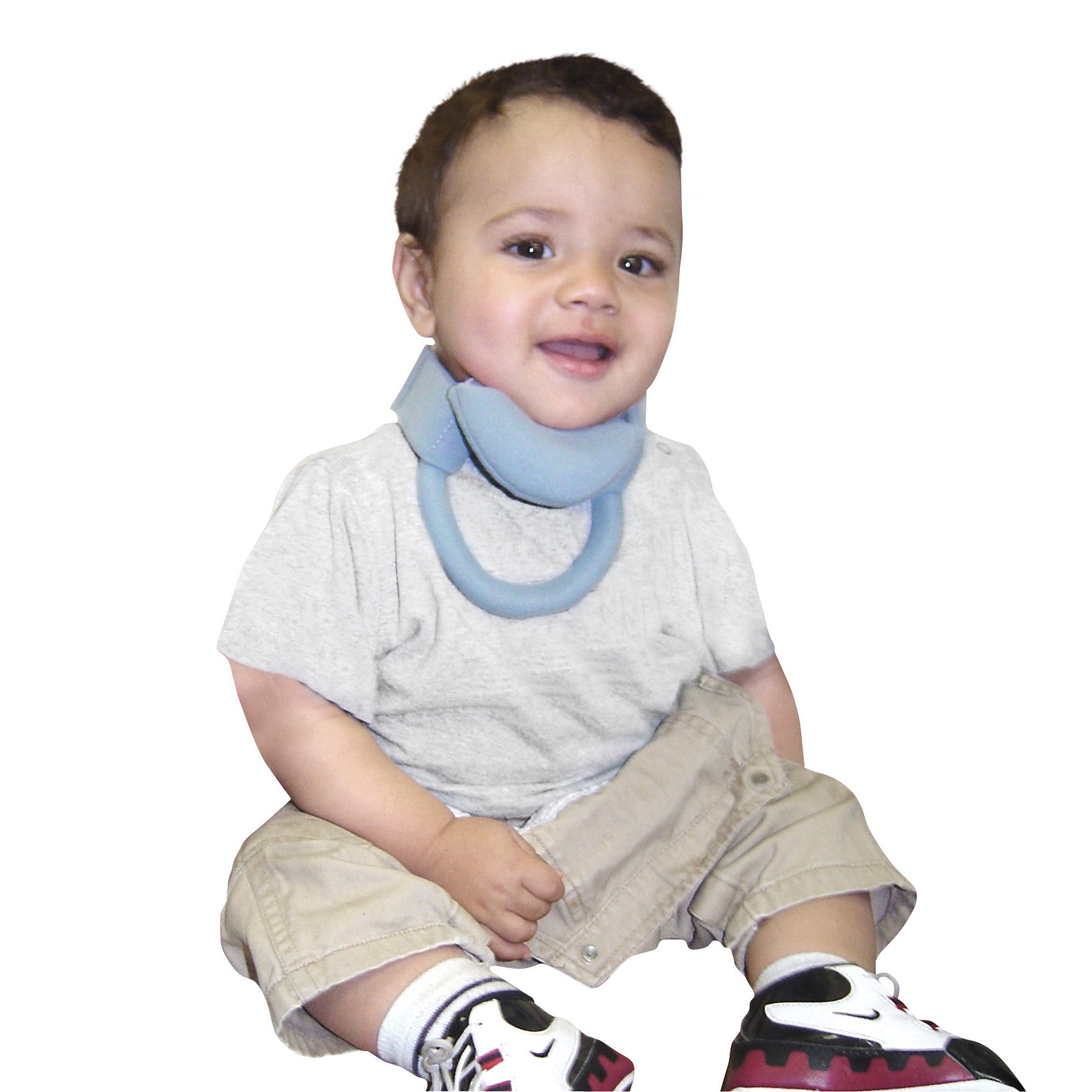 A child wearing a Headmaster Collar, which is a blue supportive neck brace, paired with a gray shirt, khaki pants, and sneakers.