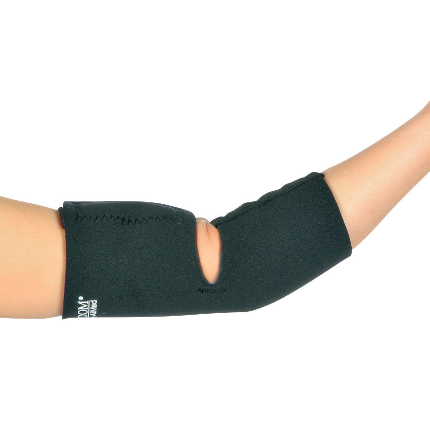 A person wears the AliMed FREEDOM Pediatric Elbow Sleeve, a black supportive sleeve with a cutout, on their bent arm.