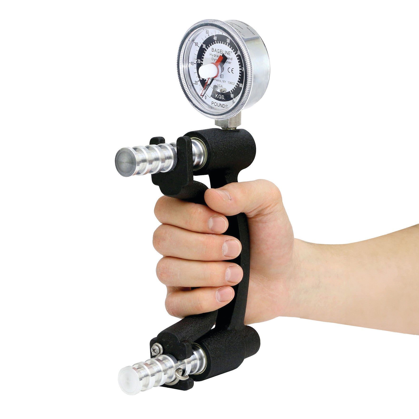 A Baseline Hand Dynamometer HD is gripped by a person, displaying measurement readings on a dial at the top.