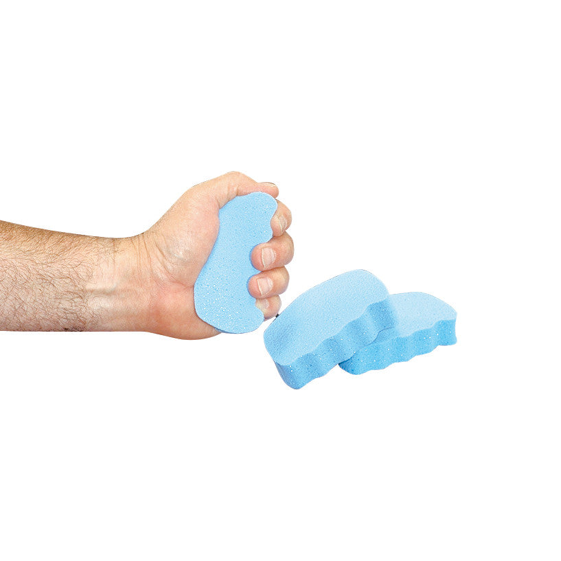 A hand squeezing a blue AliMed Hand Exerciser. Two additional exercisers are on the side.