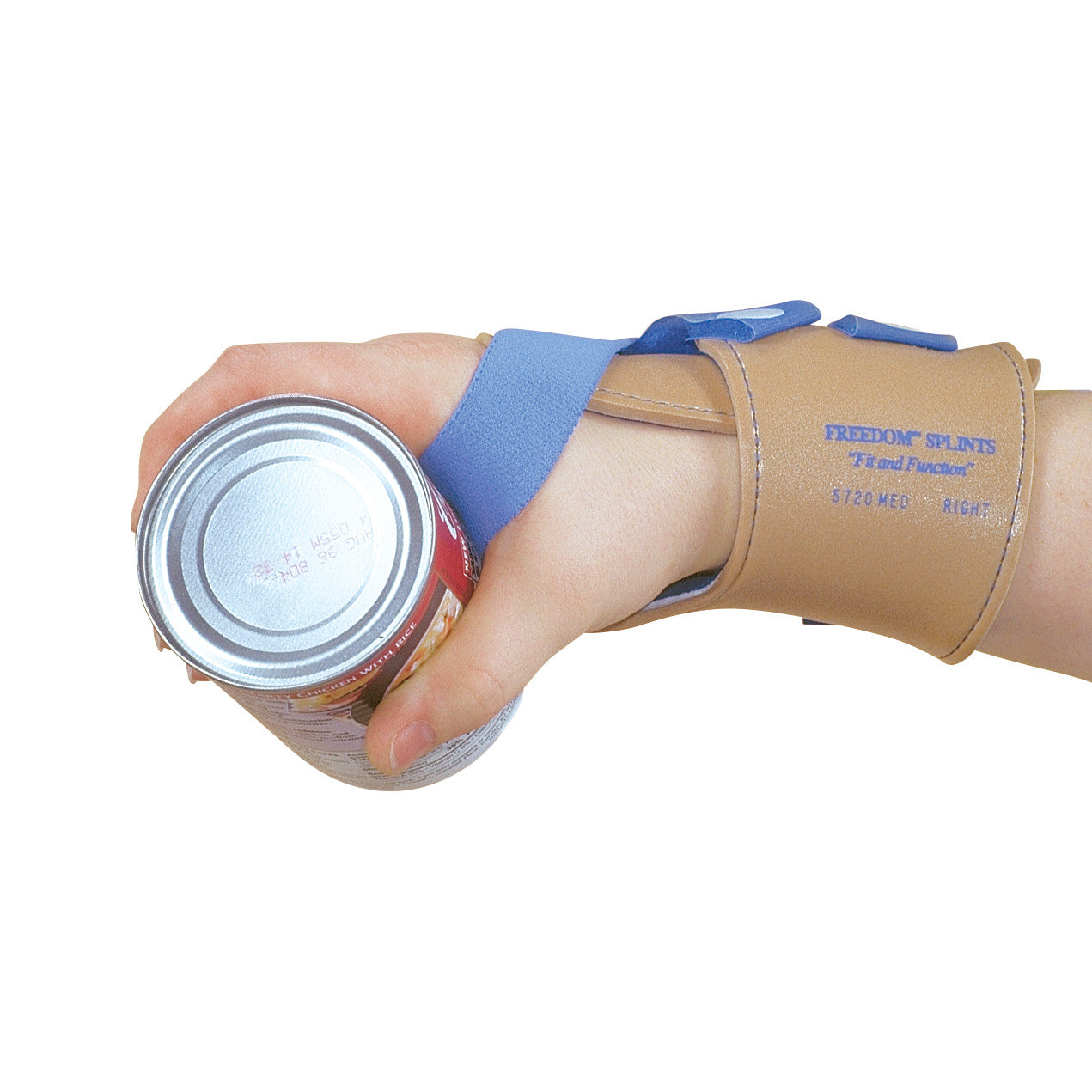 A hand wearing an AliMed FREEDOM Wrist-Trainer Gauntlet holds a can. It features a brown and blue support strap on the wrist.