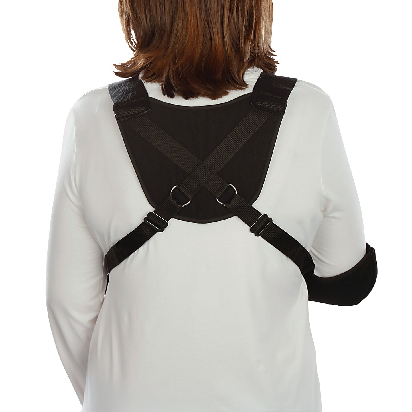 A person is wearing a Harris Hemi-Arm Sling. The back view shows black straps crossing over a white shirt.