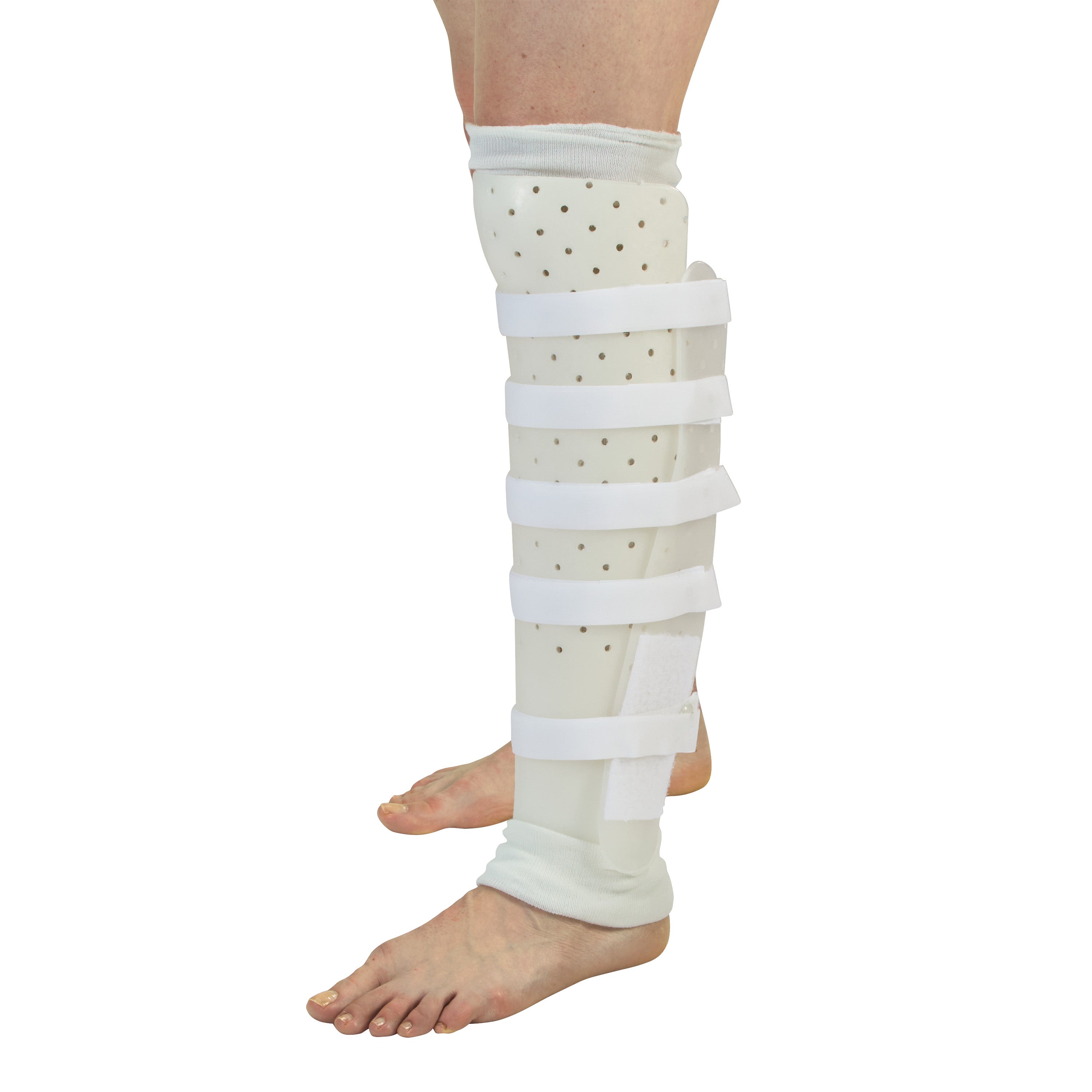 A Miami Tibial Fracture PTB Brace on a leg. It has a white, perforated shell with multiple adjustable straps for support.