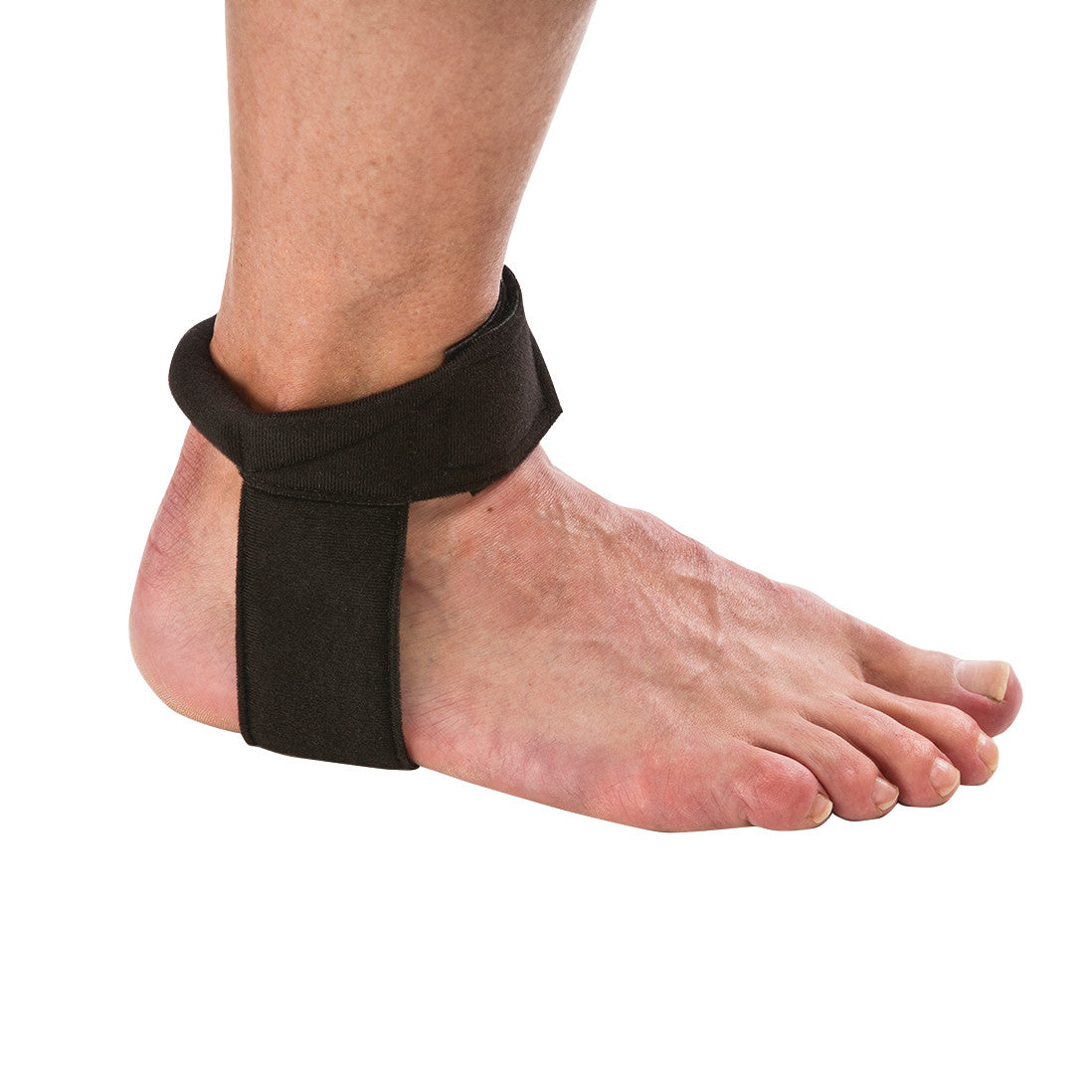 A bare foot is shown wearing a black Cho-Pat Achilles Tendon Strap, wrapped around the ankle and securing the tendon.
