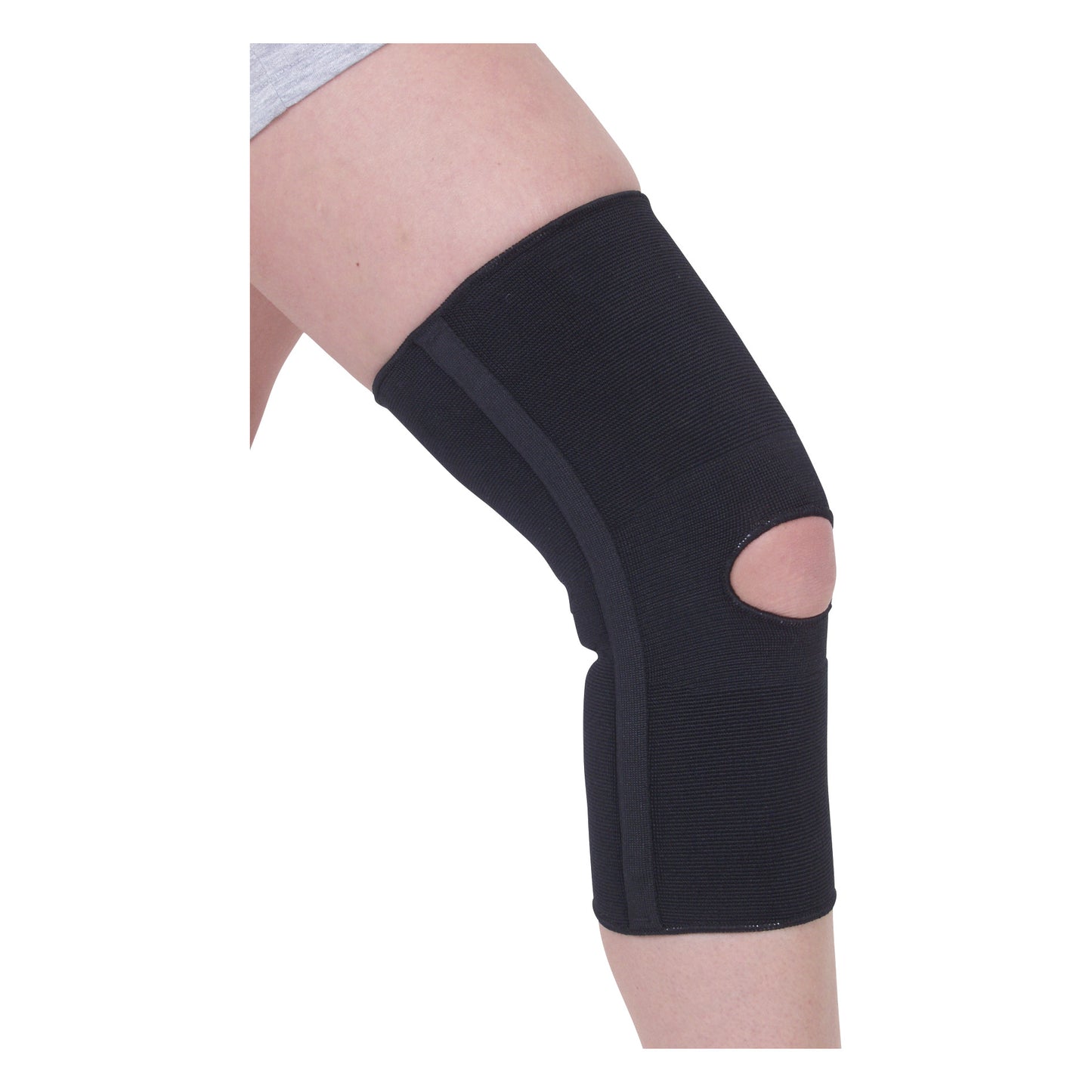 A person wears an AliMed Open Patella Brace on their knee. The brace is black with a cutout over the kneecap.