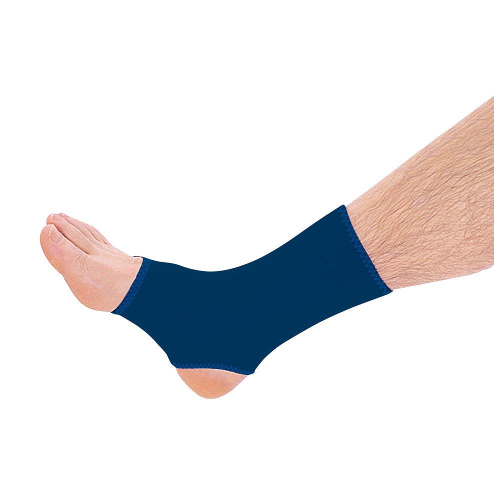 A person's foot is wearing an AliMed Neoprene Long Ankle Support, colored dark blue, covering the ankle and part of the foot.