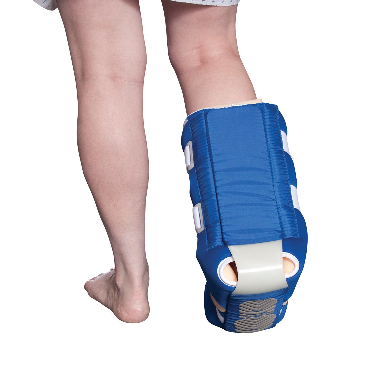 A person wears the HEELIFT AFO, a blue ankle-foot orthosis, on one leg while the other leg is bare.