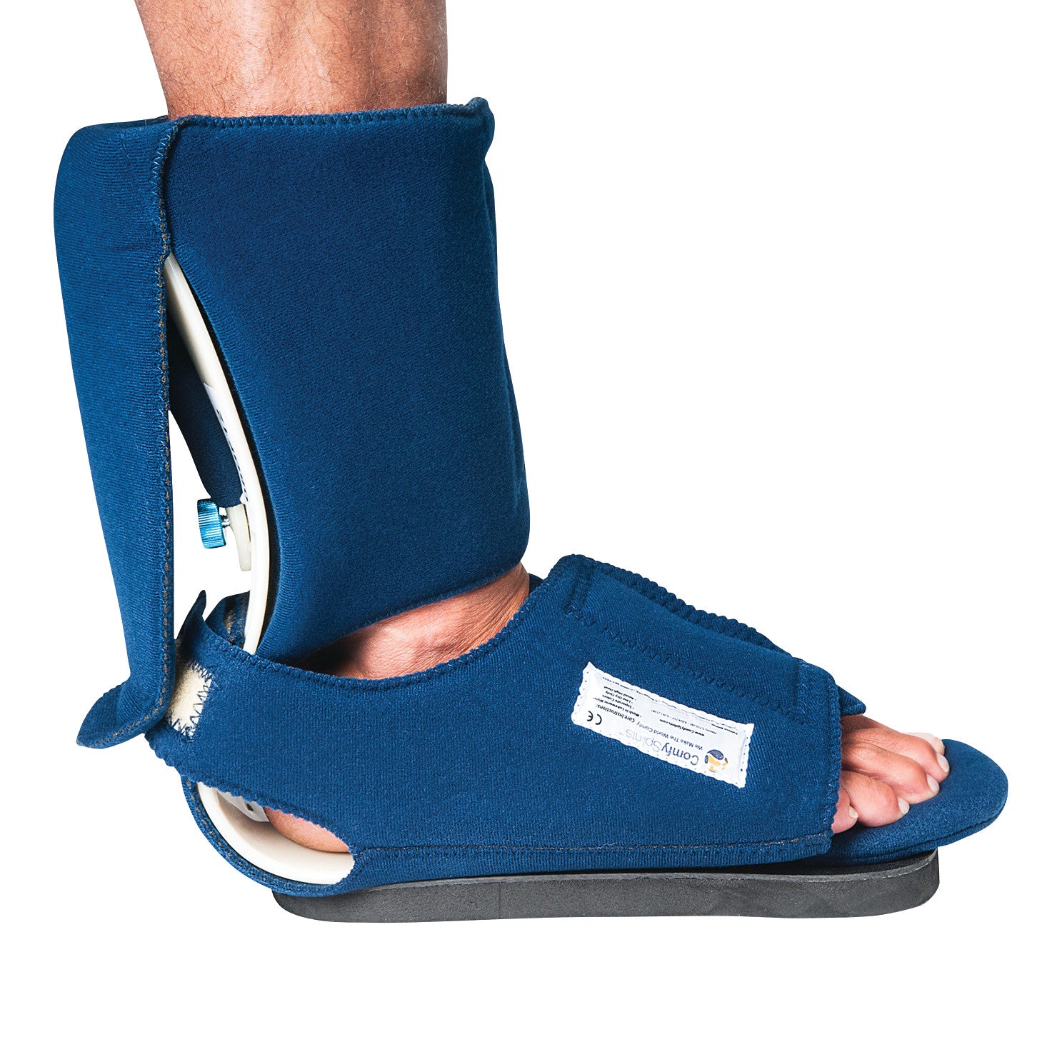 A foot wearing the Comfy Splints Adult Ambulating Contracture Boot, which is blue with a soft fabric and an open toe design.