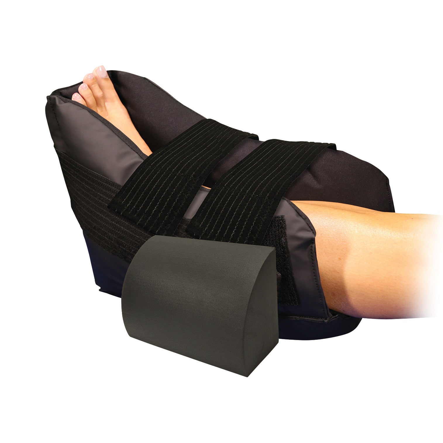 A DeRoyal PRUventor Heel Off-Loading Device secures a foot with black straps, elevating the heel. A black foam block is nearby.