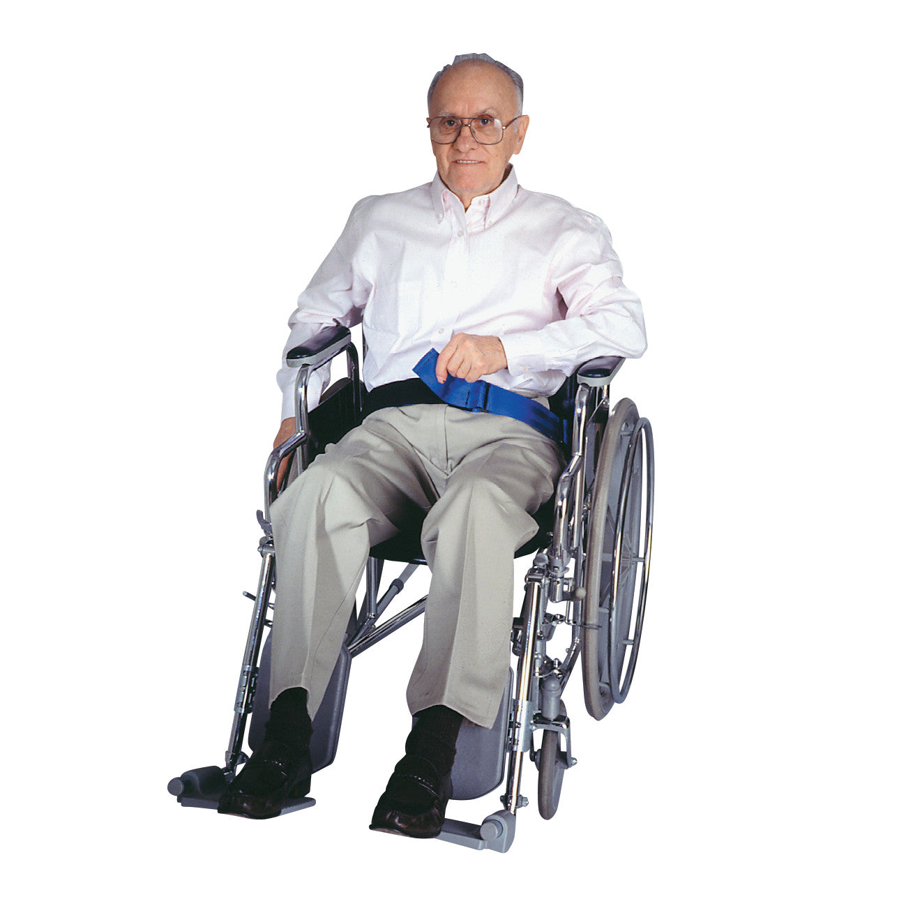 An elderly man sits in a wheelchair wearing the SkiL-Care Resident-Release Nylon Wheelchair Belt, which is blue.