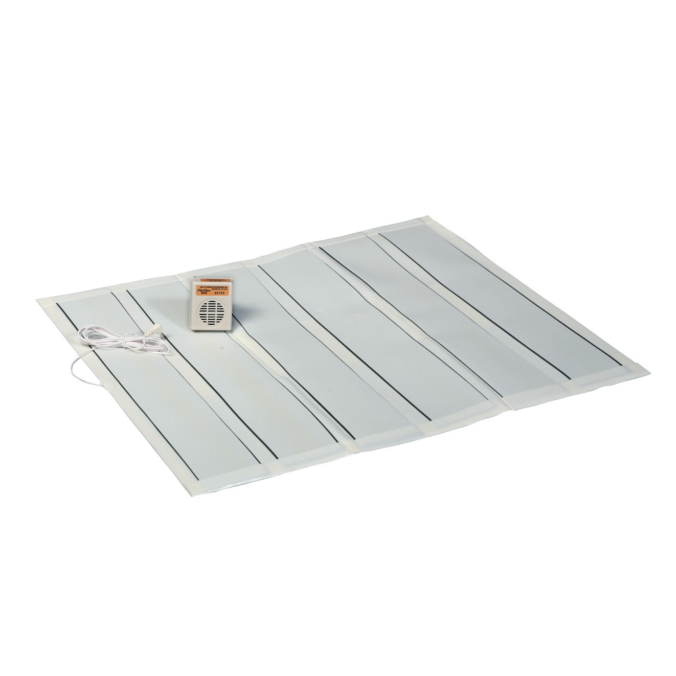 A Wet Call Alarm and Pad with a flat pad featuring black stripes, connected to a small beige alarm box with a cord.