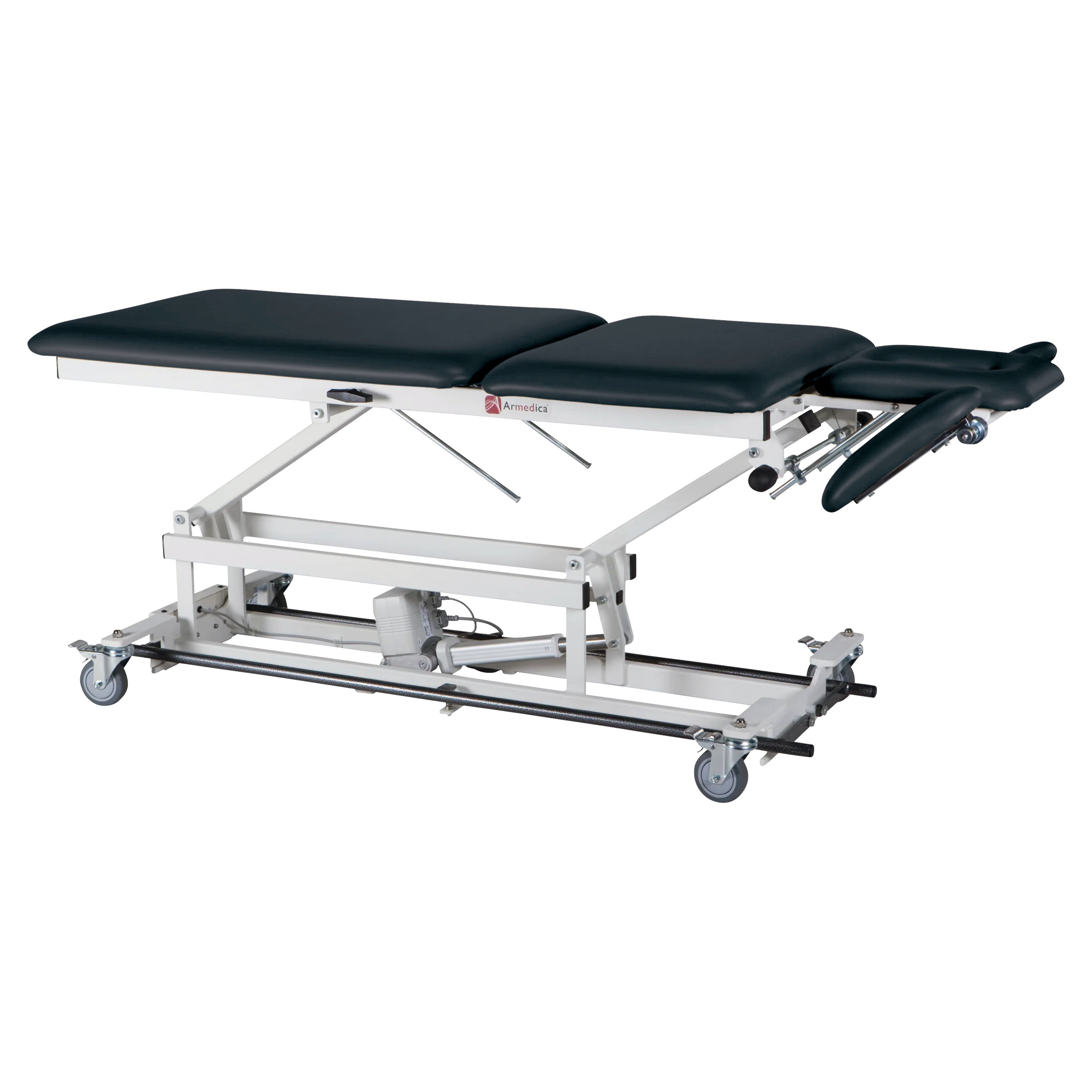 The Armedica AM-BA550 Treatment Table features an adjustable, cushioned surface, with wheels and a sturdy metal frame.