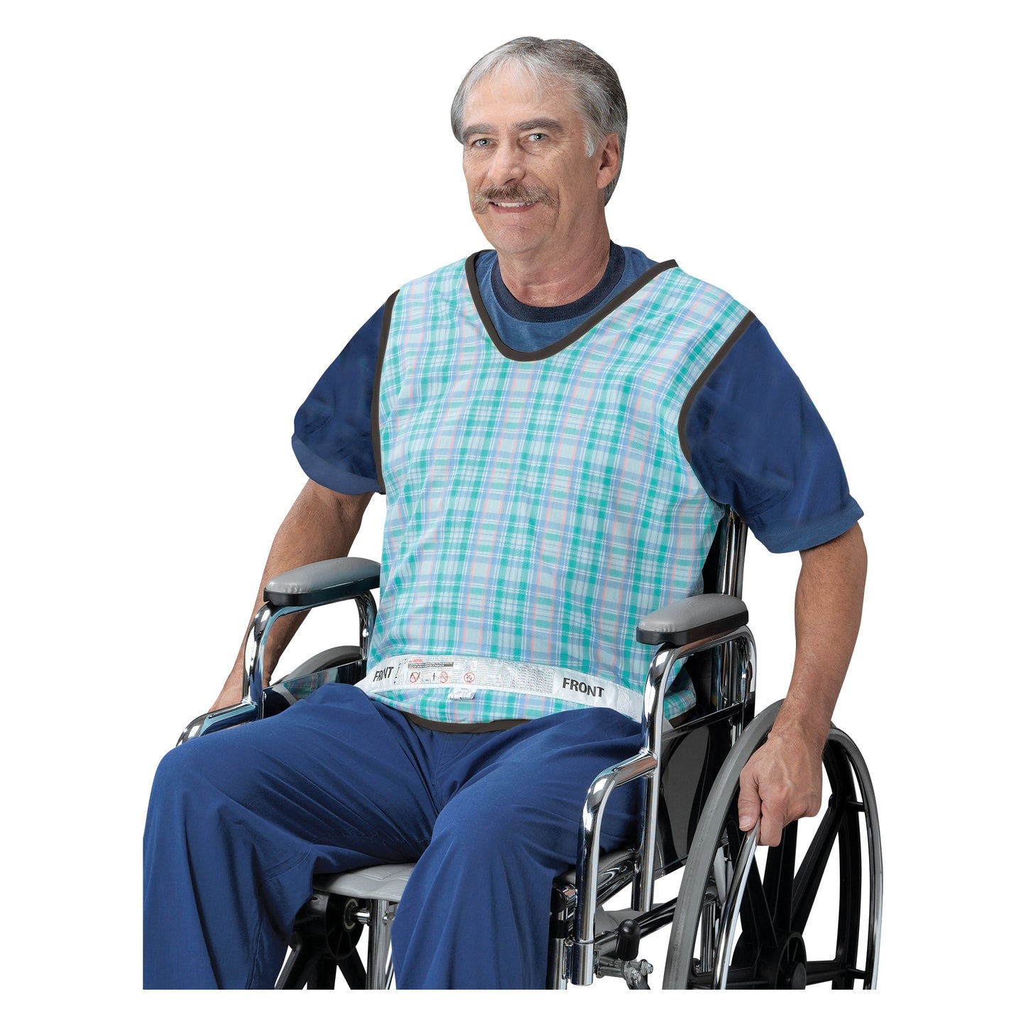 An older adult in a wheelchair wearing a Posey Safety Vest, featuring a plaid design, blue shirt, and blue pants.
