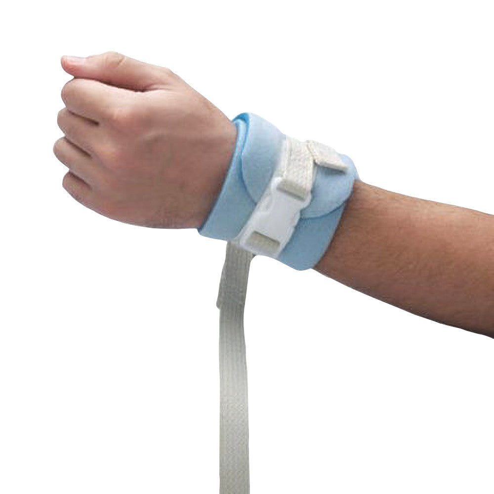A hand is secured in a Posey Limb Holder with Quick-Release Buckle, featuring a blue padded cuff and white straps.