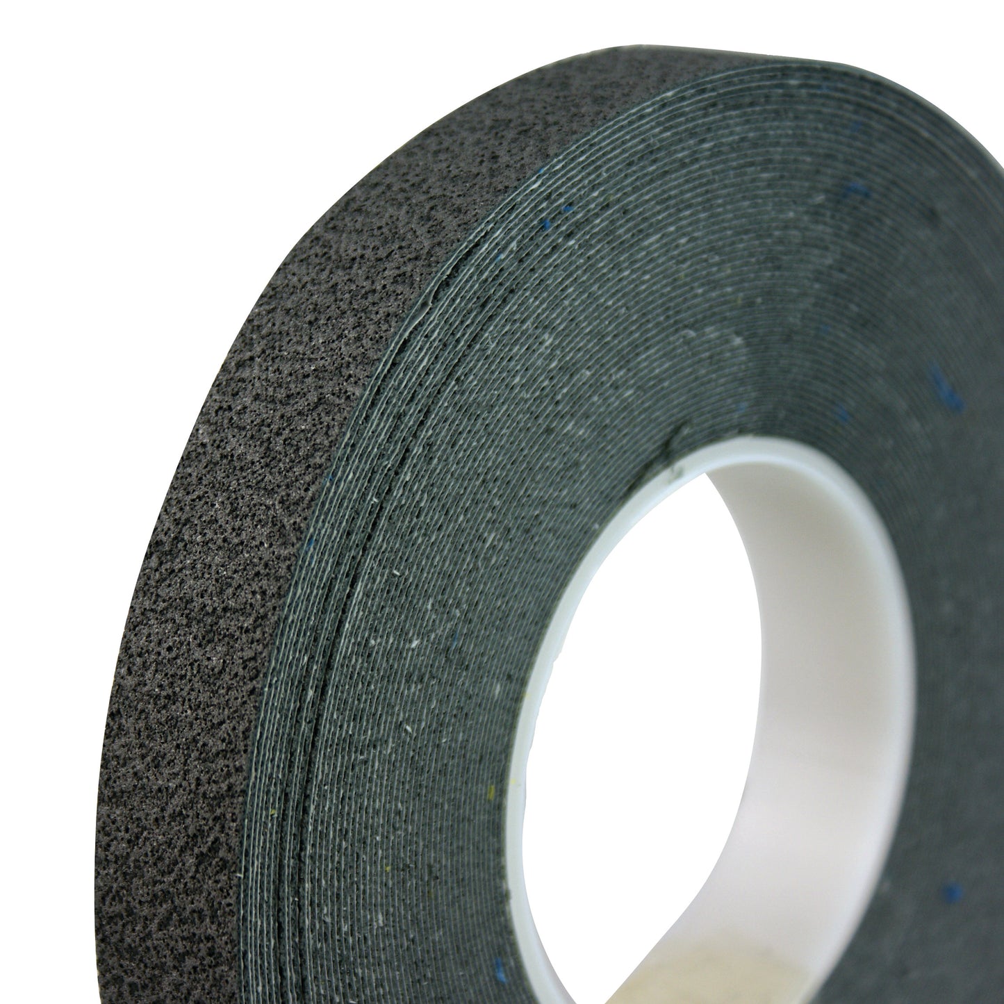 Close-up of a roll of Cushion Grip Tape, showing its textured black surface and a white core.