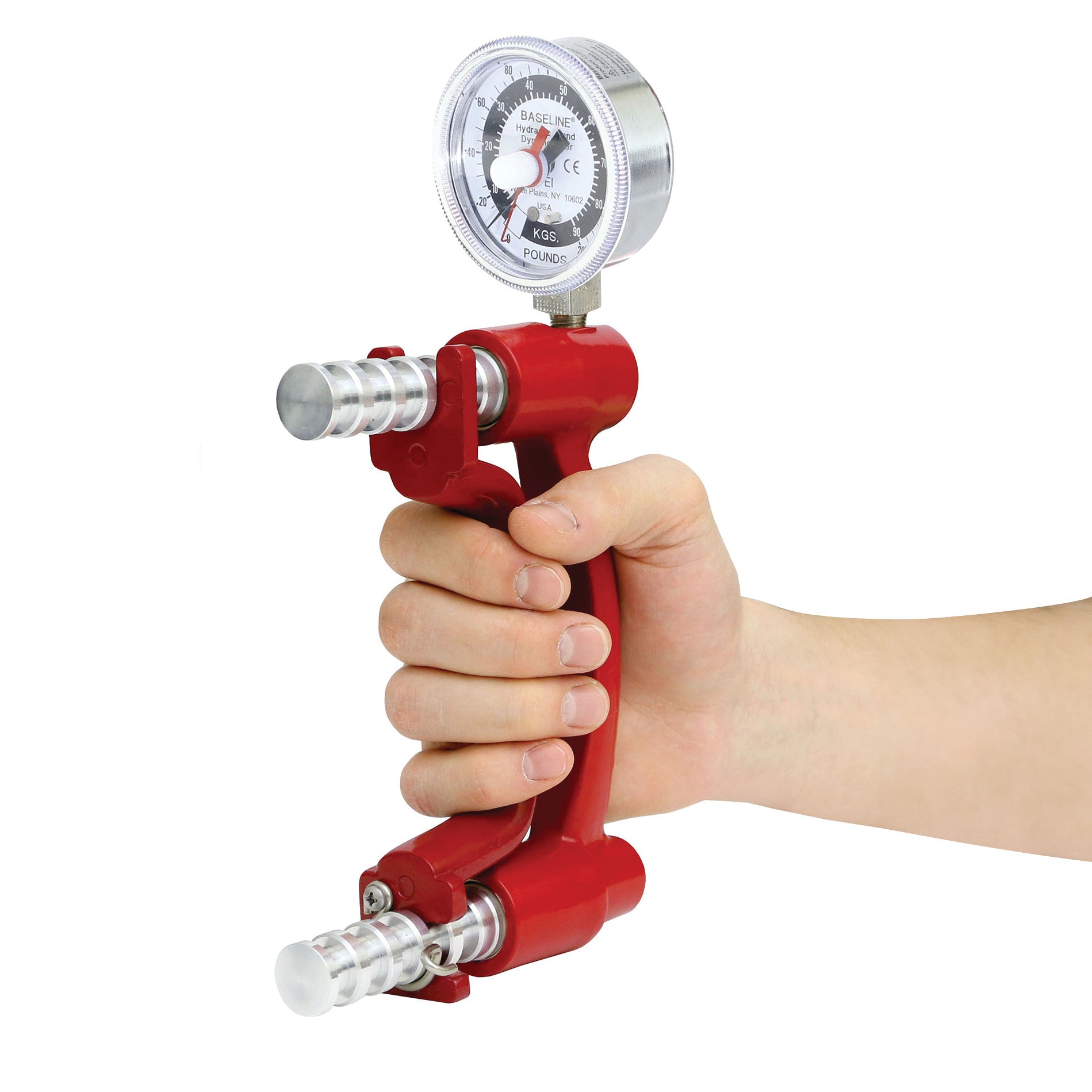 A hand holds the red Baseline Lite Hand Dynamometer, featuring a gauge to measure grip strength, with clear markings and a metallic finish.