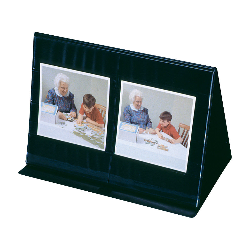 A Therapy Kit with a triangular photo display shows pictures of an elderly woman and a child assembling puzzles together.