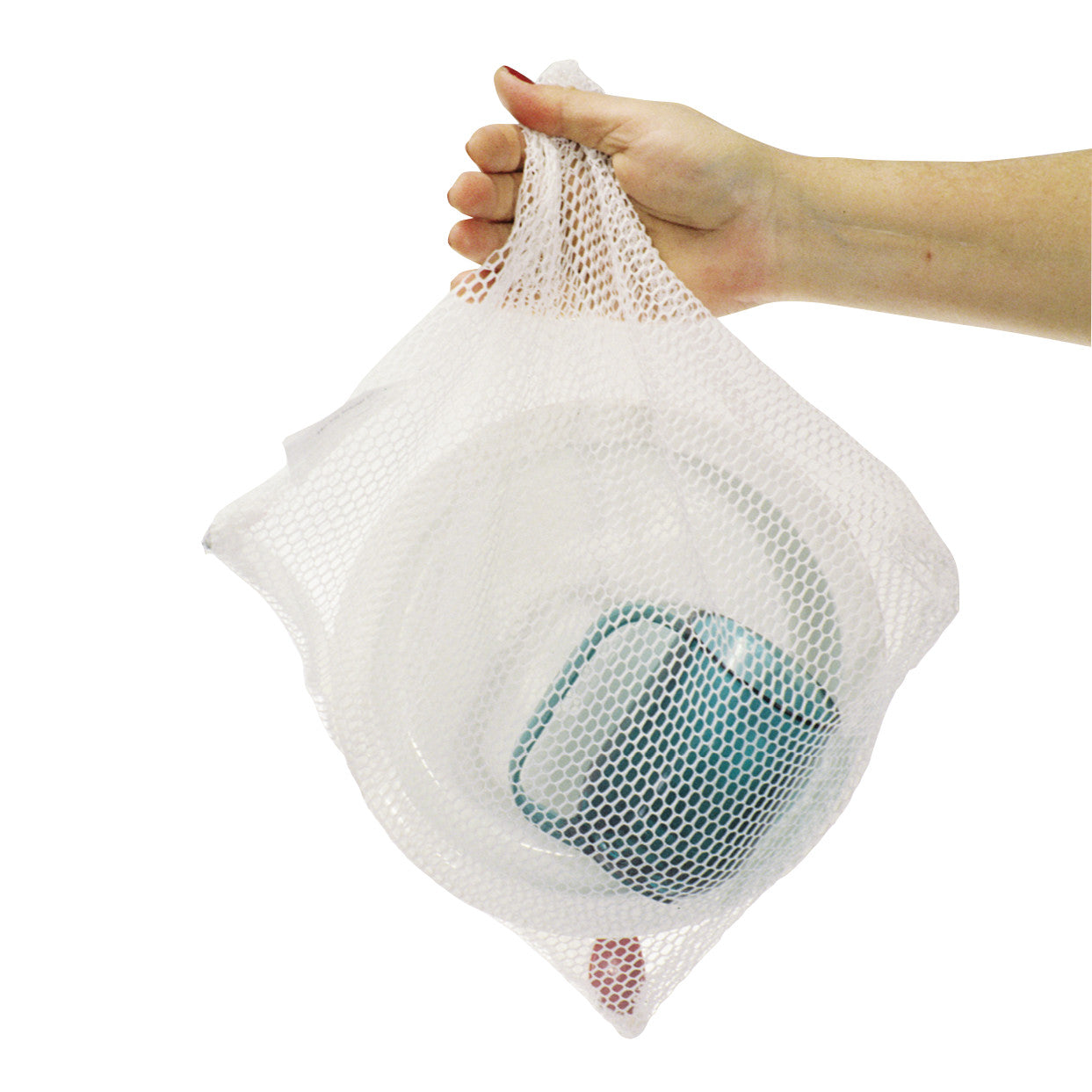 A hand holds an AliMed Mesh ADL Bag containing a blue and white dish. The bag is made of see-through mesh material.