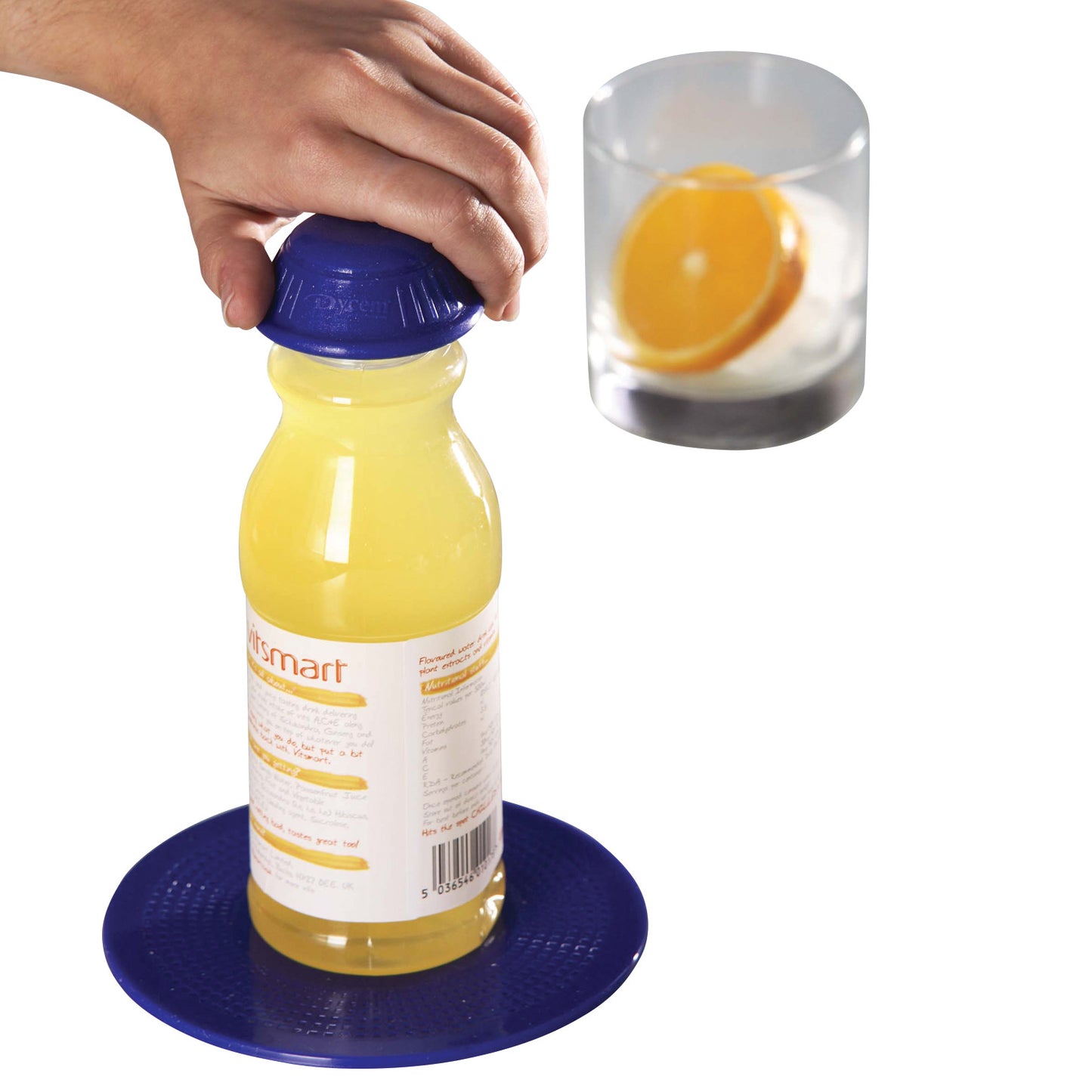 A hand uses a blue Dycem Nonslip Round Pad to grip a juice bottle, with an inset showing a glass containing an orange slice.